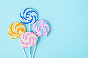 Colorful candys pastel on blue background.