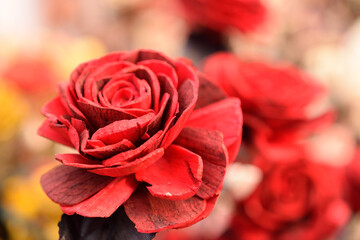 A red rose made of wood