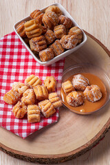 .Homemade mini churros with dulce de leche