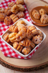 .Homemade mini churros with dulce de leche