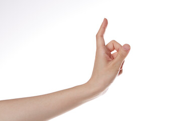 the hand of a woman with her index finger open.