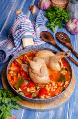 Stewed poultry with vegetables and beans