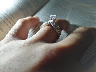 diamond ring in hand