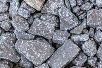 Surface of a decorative path from gray gravel.