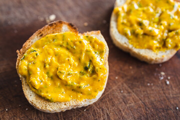 simple food ingredients, bread slices with sweet potoato and kale dip