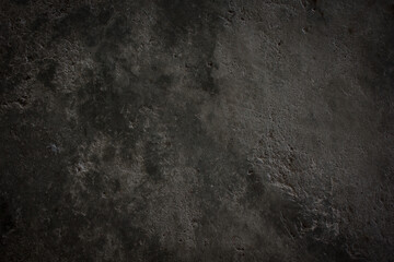The surface of the cement is cracked with abstract stone.