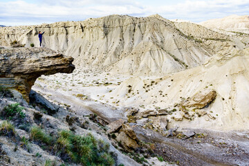Tourist on Tabernas desert, Spain