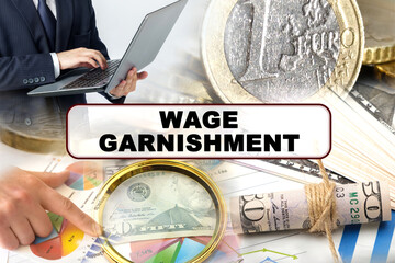 A businessman holds a folder with documents, the text on the folder is - WAGE GARNISHMENT