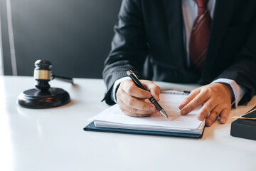 Fototapeta premium Lawyer pointing to the form signing of the contract agreement.