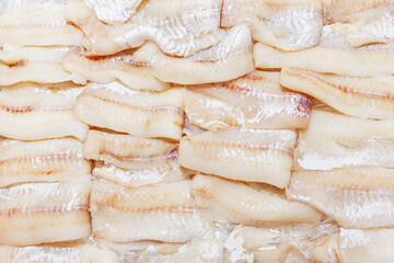 Raw white fish fillet on the counter. Healthy eating. Close-up. Background. Top view.