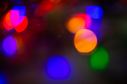 festive colourful bokeh pink blue green purple