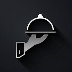 Silver Covered with a tray of food icon isolated on black background. Tray and lid sign. Restaurant cloche with lid. Long shadow style. Vector.