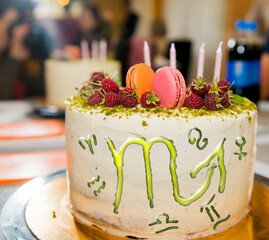 Cake and astrological horoscope symbols, zodiac sign scorpio
