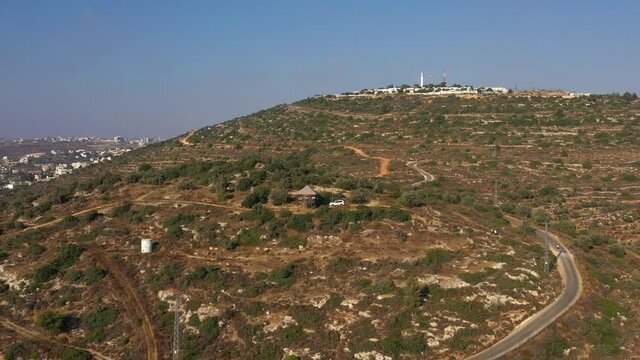 Aerial landscape view over mountains of judea and samaria village, Mateh Binyamin Regional Council, Israel. Birds eye view of Jerusalem mountains in a jurisdiction settlement occupation land