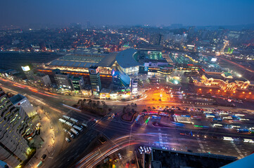 Fototapeta premium The wonderful night view of cityscape and car light.