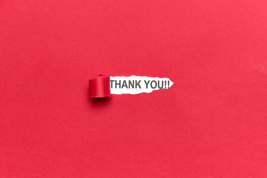 Red cardboard broken and the word THANK YOU appears below