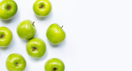 Green apples on white background. Copy space