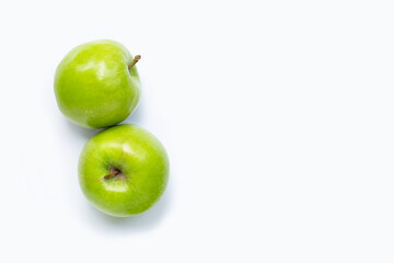 Green apples on white background. Copy space