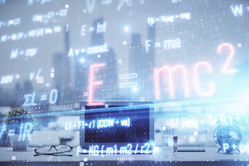 Desktop computer background and formula hologram writing. Double exposure. Education concept.