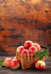Ripe garden apple fruits in basket