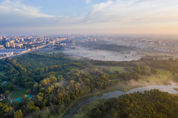 Photo from a height Foggy morning in Minsk from a drone. Loshitsa Park!