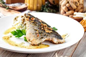 Fish fillet with mashed potato and poached egg