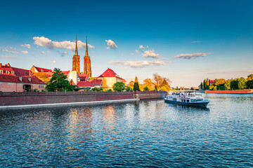Captivating evening view of Tumski island with St. John  church. Splendid spring scene of Odra river. Colorful cityscape of Wroclaw, Poland, Europe. Traveling concept background.