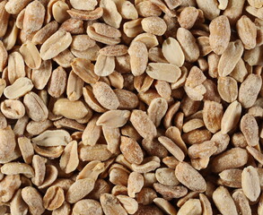 Roasted peanuts pile background and texture