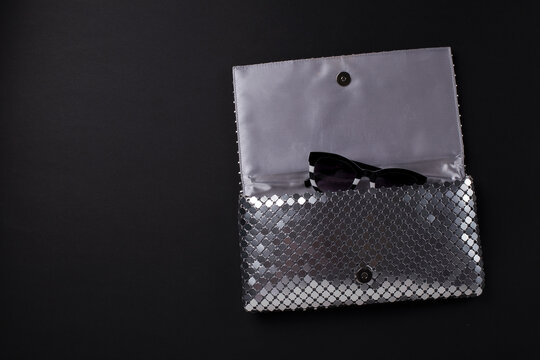 Elegant Women Envelope Bag With Silver Metallic Sequins And Fancy Sunglasses