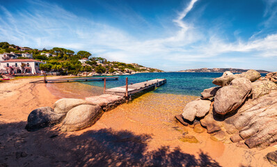 Romantic morning view of Sardinia. Impressive summer scene of public beach of Rafael port, Province of Olbia-Tempio, Italy, Europe. Calm seascape om Mediterranean sea. Traveling concept background.