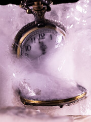 fob watch frozen in ice block frozen in time