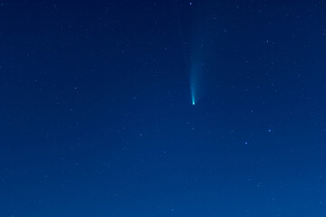 Beautiful dark night starry sky with real flying Neowise comet in 2020