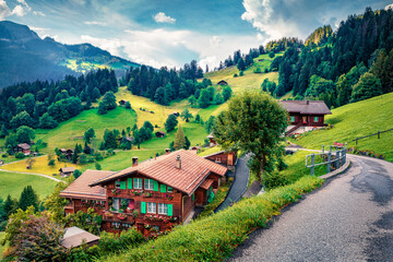 Fototapeta na wymiar Wonderful summer view of Wengen village. Splendid summer scene Swiss Alps, Bernese Oberland in the canton of Bern, Switzerland, Europe. Traveling concept background..