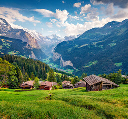 Fototapeta na wymiar Wonderful summer view of Wengen village. Stunning mornig scene of Swiss Alps, Bernese Oberland in the canton of Bern, Switzerland, Europe. Traveling concept background..
