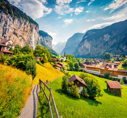 Captivating summer view of Lauterbrunnen village. Amazing morning scene of Swiss Alps, Bernese...