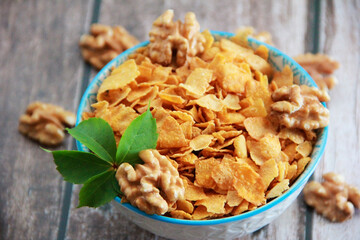 dry Breakfast muesli and walnuts in a decorative plate