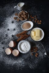 Obraz na płótnie Canvas ingredients for baking and kitchen utensils