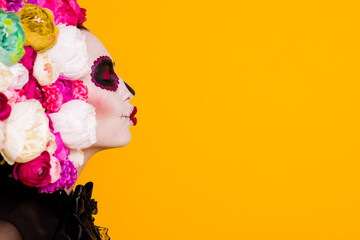 Profile headshot photo of calavera katrina undead goddess send air kiss favorite priest close eyes wear black dress death carnival costume roses headband isolated yellow color background