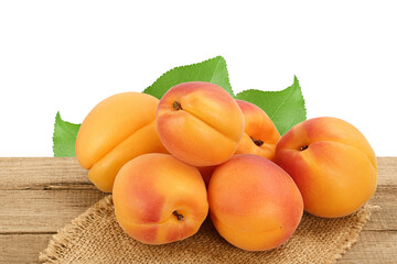 apricot fruit on wooden table isolated on white background. Clipping path and full depth of field