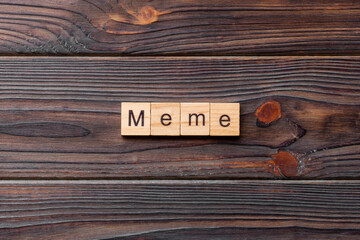 meme word written on wood block. meme text on table, concept