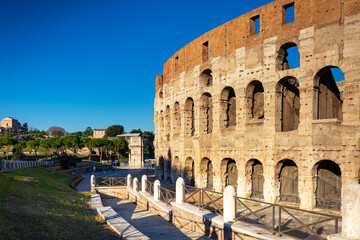 Fototapeta premium The Colosseum in Rome at sunrise, Italy