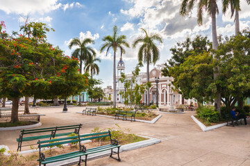Cienfuegos, Cuba-October 13, 2016. View of the  park and garden called Parque Jose Marti at central square on October 13, 2016 in historical centre of Cienfuegos town with colonial buildings.
