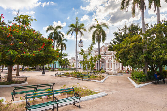 Cienfuegos, Cuba-October 13, 2016. View of the  park and garden called Parque Jose Marti at central square on October 13, 2016 in historical centre of Cienfuegos town with colonial buildings.