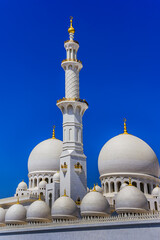 Fototapeta na wymiar Sheikh Zayed Grand Mosque located in Abu Dhabi - capital city of United Arab Emirates. Mosque was initiated by late President of UAE Sheikh Zayed bin Sultan Al Nahyan. It is largest mosque in UAE.