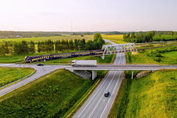 aerial top view of a multi-level highway and railroad crossing, Skulte, Latvia