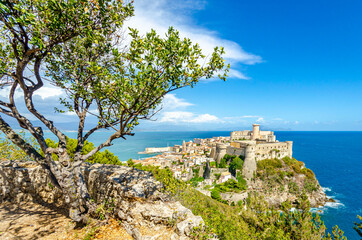 Gaeta, Italy. View of the old town and its ancient fortress from Mount Orlando in a summer day. - obrazy, fototapety, plakaty