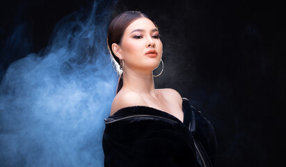 20 Asian Woman in High Fashion style over smoke fog background
