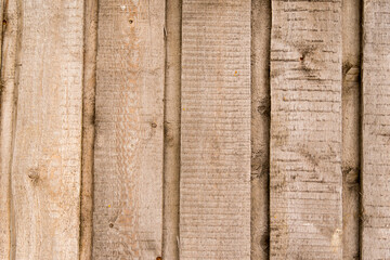 Old wooden background from natural not planed boards