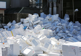 Discarded polystyrene ice boxes in the Tsukiji fish market in Tokyo, the world's wholesale fish and...