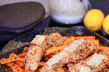 Grilled salmon with sesame seeds and carrots